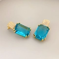 Elegant gold earrings featuring blue rectangular crystal and shimmering pave zircons - Lake Blue