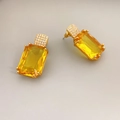 Elegant gold earrings featuring yellow rectangular crystals and white pavé accents - Yellow