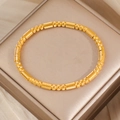 Elegant gold titanium steel beaded bracelet with textured spherical beads and tube links - Triple Bead Spiral Texture Style (SZ79) / Gold