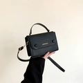 Elegant black contrast small square shoulder bag with gold hardware and top handle - Black