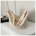Detail of off-white nylon tote bag with unique ruched scrunchie strap and zip closure - White