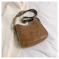 Brown vintage faux leather crossbody bag featuring a stylish herringbone woven wide strap - Khaki