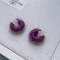 Detailed view of handmade purple wool earrings with silver trim and metallic hooks - Wonder Purple