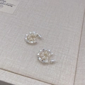 Pendientes de plata vintage con diseño de flor dentada y textura de metal cepillado - Plateado