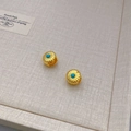 Boucles d'oreilles rondes dorées avec turquoise et motif texturé pour femme - Doré