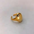 Close-up of polished 18K gold plated brass ring with irregular pebble dome texture - Polished Bean Ring