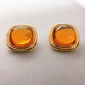Retro 18K gold plated square earrings with amber resin stones in a 45-degree view - Orange (Ear Clip)