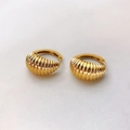 Detailed view of gold plated croissant earrings featuring vintage vertical ribbed texture - Croissant Earrings