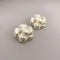 Elegant 3D camellia flower stud earrings in pearl white with high gloss metallic finish - Silver Camellia / Silver