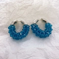 Exaggerated C-shaped hoop earrings with blue crystals and silver plated finish - Indigo Blue