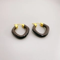 Detail of irregular translucent brown resin hoop earrings with 18K gold-plated clasp - Black