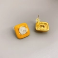 Detail of square gold plated brass stud earring with yellow enamel and centered white stone - Yellow