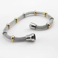 Detailed macro view of woven stainless steel mesh bracelet with multi-color beads - Gold & Steel (Steel Clasp)