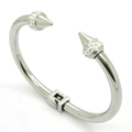 Detailed view of silver punk spike bracelet with crystal rhinestones on white background - Steel Color