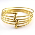 Six-layer gold plated stainless steel cable wire cuff bracelet with polished bead caps - Gold