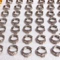 Silver twisted hoop earrings set with square zircon stones in a neat arrangement - White Gold