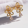 Elegant gold hollow flower earrings with white crystal centers and pear-cut zircon drops - Gold