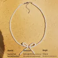 Elegante Perlenkette mit Schleife in Cremeweiß mit vergoldeter Messingkette, Länge 47cm - Halskette