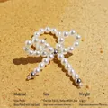 Eleganter Perlen-Schleifen-Brosche-Accessoire mit vergoldeten Messingperlen und 3cm Breite - Ring