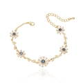 Elegant 18K gold plated daisy bracelet with blue gems and white zircon petals for women - Gold Metal with Blue Rhinestone