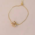 Detail of adjustable gold box chain with purple zircon flower and heart slider clasp - Purple