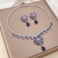 Exquisite purple flower zircon jewelry set with necklace and earrings on display case - Purple Flower Jewelry Set (PJ--8)
