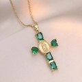 Close-up of gold-plated cross pendant featuring emerald green stones and a central relief - Gold with Green Zirconia (X2698)