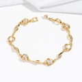 Close-up of golden link bracelet with sparkling zircon stones and round hollow design - Round Hollow Clear Style (TS0381)