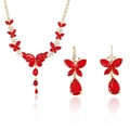 Elegantes Schmuckset aus Gold mit Schmetterlingskette und Ohrringen mit roten Steinen - Rotes Schmetterling Schmuckset (PJ--33)