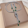 Elegant silver-toned jewelry set with teardrop green crystals and sparkling tassel necklace - Green Zirconia Jewelry Set