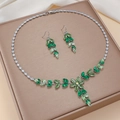 Elegant green zircon necklace and leaf-shaped earrings set on jewelry display - Green Floral Leaf (PJ-121)