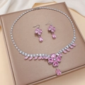 Elegant silver necklace and earrings set with pink floral zircon stones on a gift box - Pink Water Drop Floral (PJ-128)