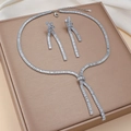 Fashion jewelry set with silver bowknot necklace and earrings featuring cubic zirconia - Clear Bowknot Square Zircon (PJ-110)