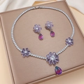 Elegant purple crystal flower jewelry set with necklace and drop earrings on silk - Purple Crystal Gradient (PJ-125)