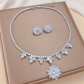 Macro shot of silver jewelry set with flower-shaped zircon pendants and tennis chain style - Clear Large Floral (PJ-193)