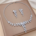 Luxurious silver jewelry set with zircon necklace and matching leaf-shaped drop earrings - Clear Pear Shape Dangle (PJ-185)