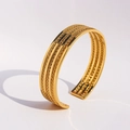 Golden multi-layer braided chain cuff bracelet with vintage textured metal finish - Gold