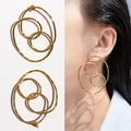 Boucles d'oreilles géométriques dorées à anneaux multiples avec une finition polie - Or