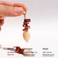Orecchini a foglia fatti a mano con scaglie di conchiglia e pendente color crema - Orecchini