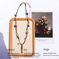 Collana con occhio di tigre e ceramica blu con ottone dorato e perle d'acqua dolce - Collana