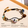 Bracciale fatto a mano con occhio di tigre e perle di ceramica viola macchiate - Bracciale