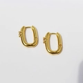 Minimalist gold-plated brass U-shaped hoop earrings featuring sparkling pink zircon accents - Gold