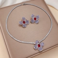 Elegant purple zircon flower jewelry set with necklace and earrings on premium display - Deep Red Purple Floral (PJ-166)