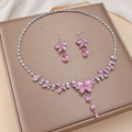 Pink zircon butterfly jewelry set with necklace and earrings on gold display - Pink Butterfly Shape (PJ-181)