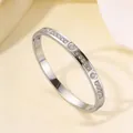 Detailed view of silver titanium steel heart bracelet with embedded cubic zirconia crystals - TT0989-Silver Steel Heart Style (TT0989-2)