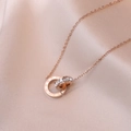 Rose gold stainless steel necklace with interlocking rings and roman numerals - Rose Gold