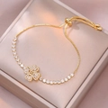Goldenes Kleeblatt Armband mit weißen Zirkonia und verstellbarem Schiebeverschluss - Goldener Full Diamond Kleeblatt Tennis Stil (TS0522)