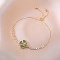 Adjustable gold clover bracelet with green crystals and clear stones on satin - Gold Green Diamond Clover Style (TS0080)