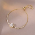 Elegant gold flower bolo bracelet with sparkling crystals and adjustable slider clasp - Gold Blooming Flower Style (TS0627)