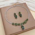 Silver-plated jewelry set featuring emerald green stones and zircon butterfly accents - Emerald Style Imitation (2)